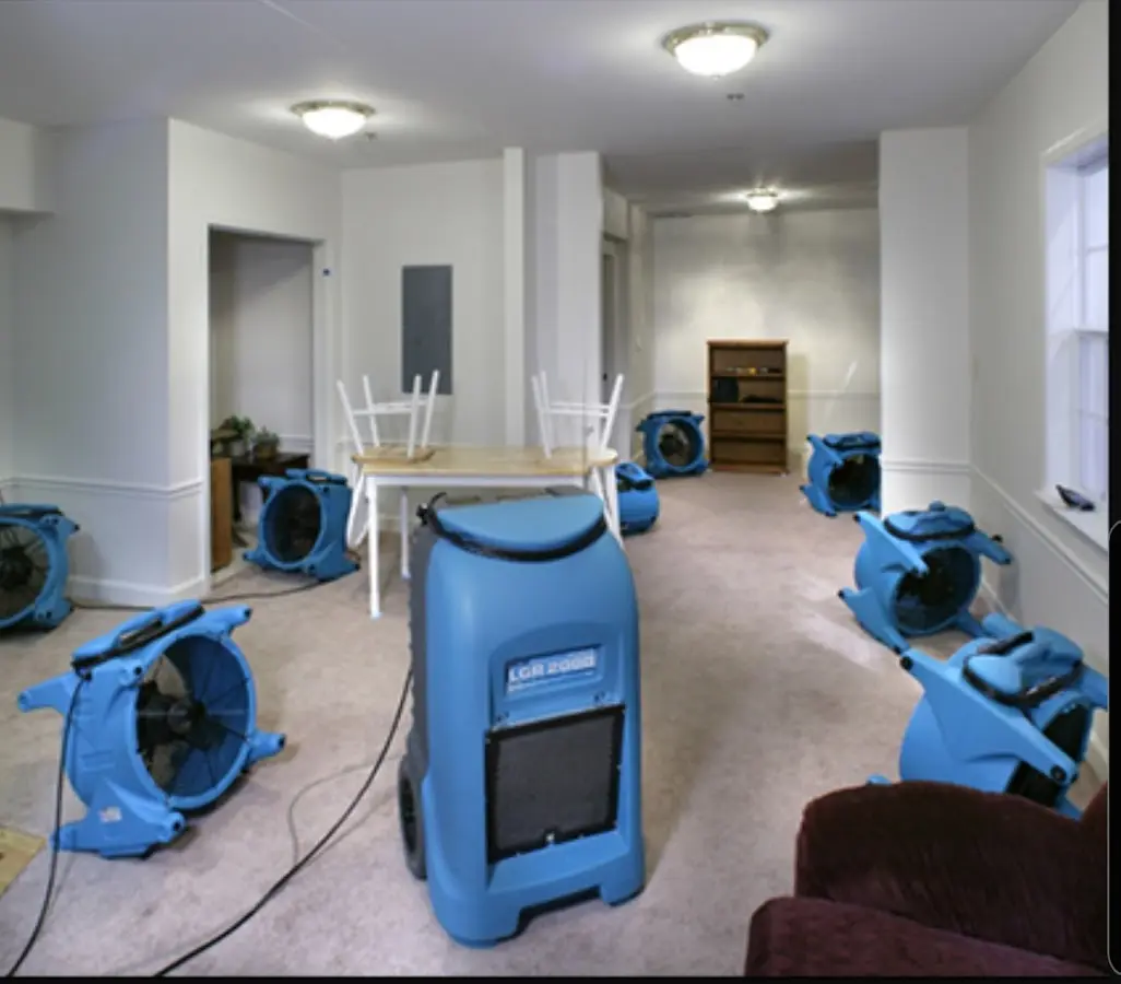 Air movers and dehumidifier setup for Water Damage Restoration in Madison